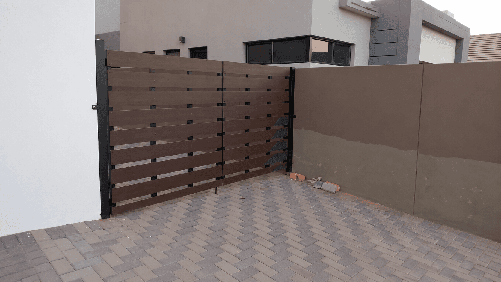 Gallery placeholder — gates photo 1 of 9 (Director asset pending)